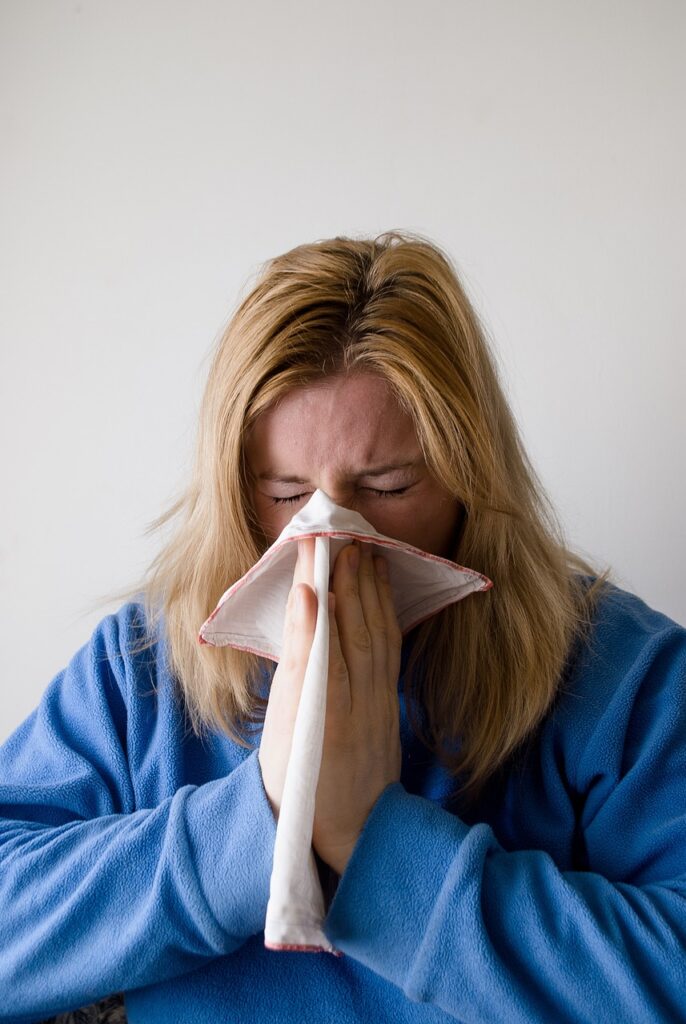 woman, sneeze, blowing nose-698974.jpg